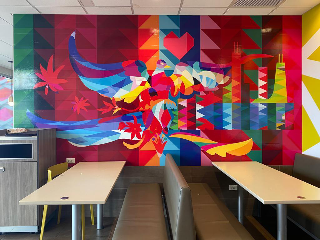 Photo of McDonald’s restaurant inside mural wrapped by Mauricio Ramirez