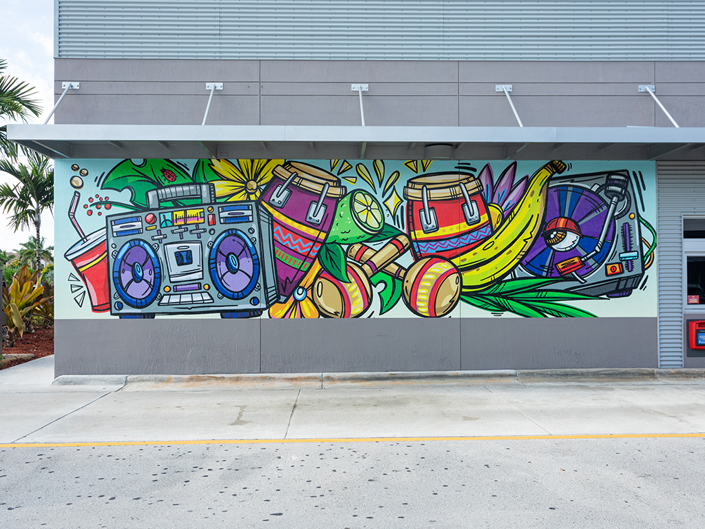Photo of McDonald’s restaurant side mural wrapped by Carlos Solano