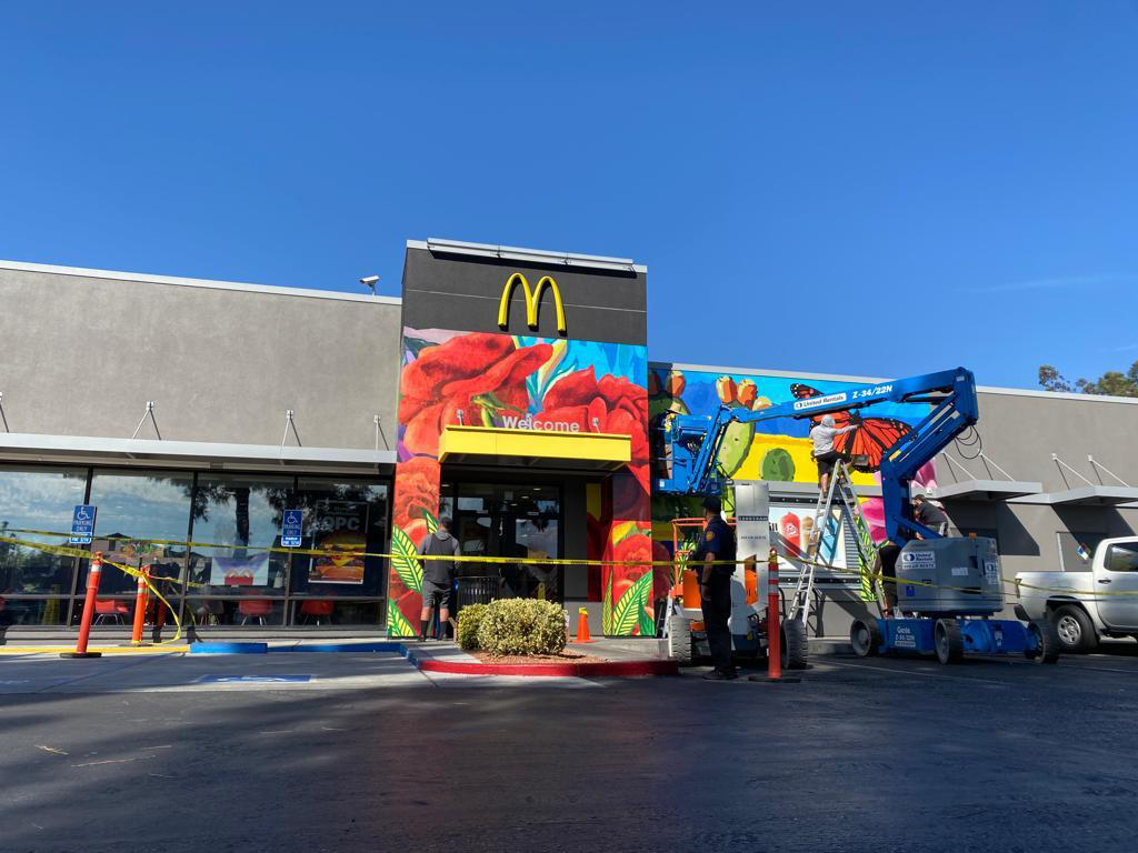 Photo of McDonald’s restaurant inside mural wrapped by Hector Covarrubias
